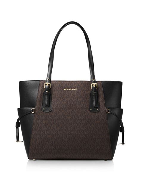 michael kors voyager east west crossgrain leather tote black|michael kors voyager tote merlot.